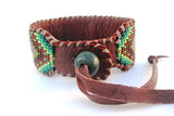 Geometric Mandala Men's Boho Cuff Bracelet on Chocolate Deer Hide Leather, Green and Purple Seed Beads